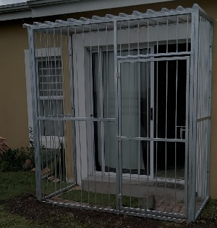 Steel security fencing installed around a home